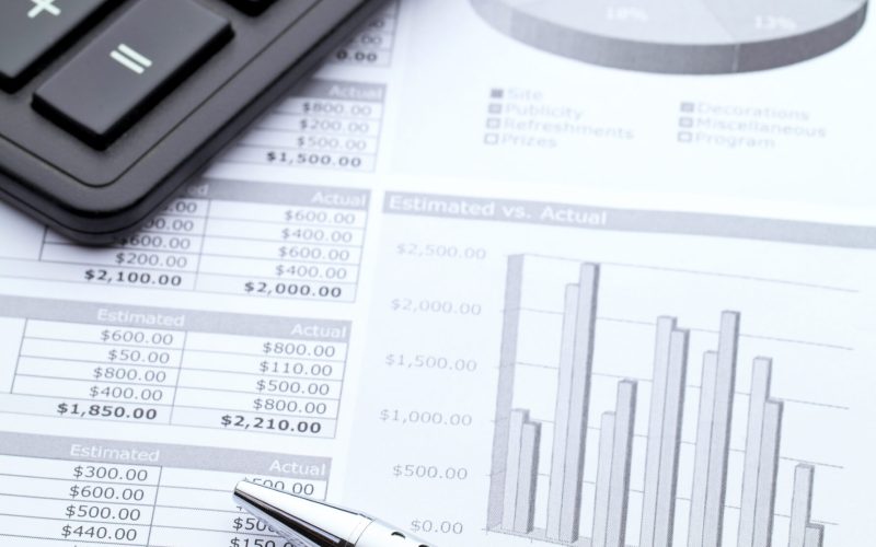 Data graph with calculator and pen Data graph with calculator and pen